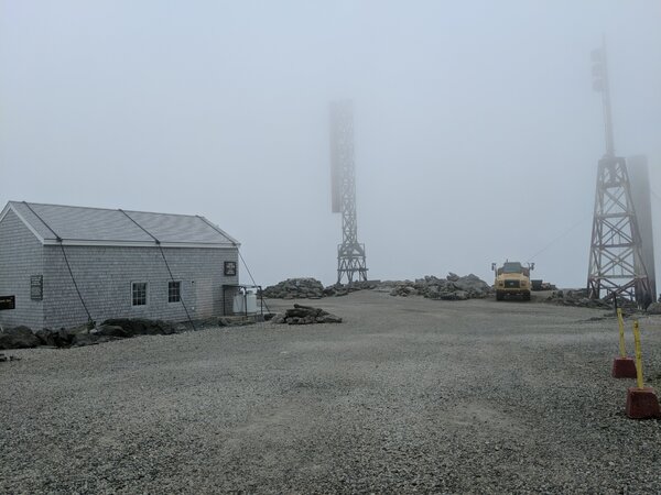 Cloud-covered view of the summit of Mount Washington